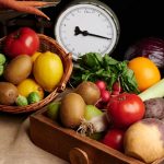 a wooden box filled with lots of different types of vegetables